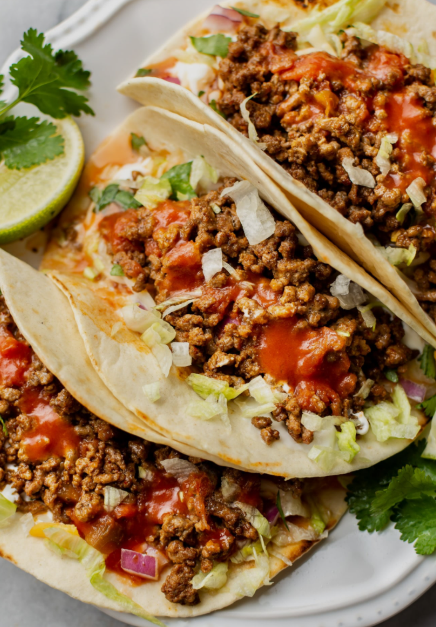 Tree ground beef tacos with fresh lettuce. Offer starts tomorrow and this offer ends January 12 2025